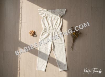 jumpsuit with ruffles by the neck